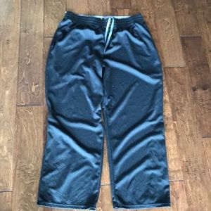 Men’s black under armor workout pants.